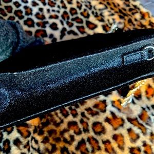 black velvet bag by Jimmy Choo Perfume.